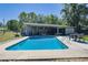 Large backyard pool with patio and lounge area ideal for outdoor gatherings and relaxation at 2808 Ne 24Th Ct, Ocala, FL 34470