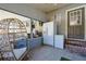 Relaxing porch with a comfortable chair and access to a refrigerator and freezer at 2808 Ne 24Th Ct, Ocala, FL 34470