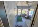 Inviting sunroom with comfortable seating and a view of the outdoor pool area at 2808 Ne 24Th Ct, Ocala, FL 34470