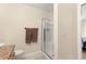 Bathroom featuring a glass enclosed shower and soft neutral color walls at 3017 Moultrie Way, The Villages, FL 32162