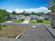 Aerial view of the home showcasing its well-manicured lawn and neighborhood setting at 5327 Sw 89Th St, Ocala, FL 34476