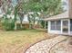 Spacious backyard featuring mature trees and wooden fence at 5327 Sw 89Th St, Ocala, FL 34476
