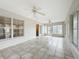 Spacious, sunlit enclosed patio with tile flooring at 5327 Sw 89Th St, Ocala, FL 34476