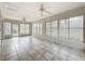 Spacious sun room with tile floor and multiple windows offering abundant natural light at 5327 Sw 89Th St, Ocala, FL 34476