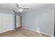 Bedroom featuring carpet floors, a ceiling fan, and closet space at 5331 Old Hickory Ln, Fruitland Park, FL 34731