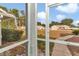 Exterior view from the screened front porch looking out at the neighborhood homes at 5331 Old Hickory Ln, Fruitland Park, FL 34731