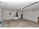 Spacious garage interior offering ample storage, utility units, and access to home systems at 5331 Old Hickory Ln, Fruitland Park, FL 34731