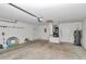 Spacious garage interior offering ample storage, utility units, and access to home systems at 5331 Old Hickory Ln, Fruitland Park, FL 34731