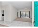 Bright living room with sliding glass doors leading to outdoor space and a ceiling fan at 5331 Old Hickory Ln, Fruitland Park, FL 34731