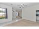 Bright living space with tile floors, neutral paint, and an open floor plan at 5331 Old Hickory Ln, Fruitland Park, FL 34731