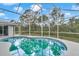 Inviting screened pool offers a refreshing escape with ample space for lounging and entertaining at 5331 Old Hickory Ln, Fruitland Park, FL 34731