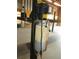 Car lift located inside the large garage with ample space at 5355 Sw 31St St, Ocala, FL 34474