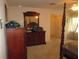 Spacious main bedroom featuring a four-poster bed, dresser, and closet for ample storage at 5355 Sw 31St St, Ocala, FL 34474