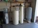 Water softener system features a water cooler, a sediment filter, and a water softener tank at 5355 Sw 31St St, Ocala, FL 34474