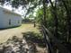 View of the yard with a wooden fence surrounding the entire property at 5355 Sw 31St St, Ocala, FL 34474