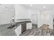 Open concept kitchen boasting stainless steel appliances and granite countertops at 6756 Sw 151St Loop, Ocala, FL 34473