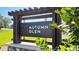 Autumn Glen community entrance sign nestled among lush foliage, welcoming residents and visitors at 7092 Se 113Th Ln, Belleview, FL 34420