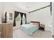 Bedroom featuring a bed, neutral walls, a ceiling fan, and bright natural lighting at 8090 Penrose Pl, Wildwood, FL 34785