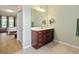 Bathroom featuring marble counter tops and ample cabinet space at 8955 Sw 86Th Loop, Ocala, FL 34481