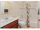 Bathroom featuring stylish wood cabinet, white countertop, bathtub, and shower at 8955 Sw 86Th Loop, Ocala, FL 34481