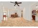 Open-concept dining room showcases tile flooring, natural lighting, and convenient access to other living areas at 8955 Sw 86Th Loop, Ocala, FL 34481