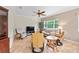 Comfortable living room with large window providing natural light at 8955 Sw 86Th Loop, Ocala, FL 34481