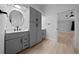 Bathroom featuring a vanity, countertop, modern fixtures, and a glass shower stall at 9885 Se 144Th St, Summerfield, FL 34491
