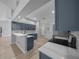 Modern kitchen features quartz countertops, stainless steel appliances, and shaker cabinets at 9885 Se 144Th St, Summerfield, FL 34491