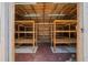 Spacious shed with ample storage space and well-built wooden shelving at 9885 Se 144Th St, Summerfield, FL 34491