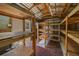 Interior view of shed with organized storage shelves and plenty of workspace at 9885 Se 144Th St, Summerfield, FL 34491