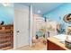 Bathroom features a shower curtain, cabinet, toilet, and granite countertop at 1039 Ne 25Th St, Ocala, FL 34470