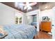 Bedroom with hardwood ceiling, and natural light at 1039 Ne 25Th St, Ocala, FL 34470