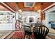Open kitchen with white cabinetry, modern appliances, and a cozy dining area at 1039 Ne 25Th St, Ocala, FL 34470