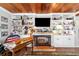 Living room showcasing built-in shelving with a fireplace, perfect for displaying personal items at 1039 Ne 25Th St, Ocala, FL 34470