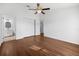 Spacious bedroom with an ensuite bathroom, ceiling fan, and closet at 10881 Sw 62Nd Avenue Rd, Ocala, FL 34476