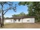 Lovely single-story home with well-maintained lawn and inviting facade at 10881 Sw 62Nd Avenue Rd, Ocala, FL 34476