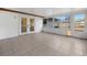 Sun room with tiled floors and access to the exterior at 10881 Sw 62Nd Avenue Rd, Ocala, FL 34476