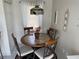 Cozy breakfast nook with round table, chairs, and decorative lighting at 11120 Sw 71St Terrace Rd, Ocala, FL 34481