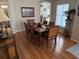 Formal dining room featuring hardwood floors and a stylish dining set at 11120 Sw 71St Terrace Rd, Ocala, FL 34481