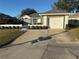 Charming single-story home featuring a well-manicured lawn and attached two-car garage at 11120 Sw 71St Terrace Rd, Ocala, FL 34481
