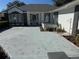 Home's front entrance showcasing landscaping, well-manicured lawn and shrubs at 11120 Sw 71St Terrace Rd, Ocala, FL 34481