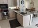 Well-equipped kitchen featuring granite countertops, stainless steel appliances, and ample storage at 11120 Sw 71St Terrace Rd, Ocala, FL 34481