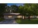 Charming single-story home with stone accents, well-maintained lawn, mature trees, and a welcoming front entrance at 16 Water Trak, Ocala, FL 34472