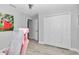 Bedroom features a closet and ensuite access at 16848 Sw 41St Avenue Rd, Ocala, FL 34473