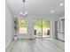 Bright dining area with backyard views, chandelier and easy access to the kitchen at 16848 Sw 41St Avenue Rd, Ocala, FL 34473