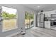 Bright kitchen with stainless appliances, and view of outdoor patio at 16848 Sw 41St Avenue Rd, Ocala, FL 34473