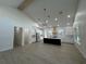 Open-concept kitchen with a large island, stylish cabinetry, and stainless steel appliances at 18890 Sw 60Th St, Dunnellon, FL 34432