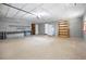 Large garage with ample storage space, a work bench, and lots of room to move around at 19300 Sw 60Th St, Dunnellon, FL 34432