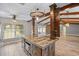 Kitchen featuring a unique island, stainless steel appliances, and abundant natural light at 19300 Sw 60Th St, Dunnellon, FL 34432
