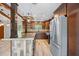 Beautiful kitchen boasting custom cabinets, stainless appliances, and rustic-style island at 19300 Sw 60Th St, Dunnellon, FL 34432